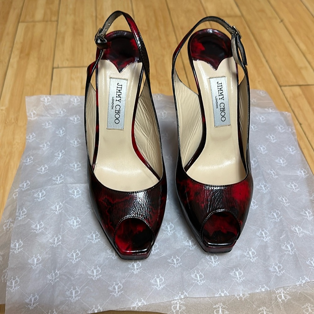 Jimmy Choo red and black pump.